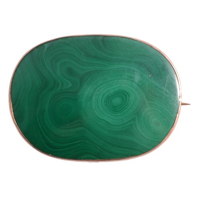 Lot 216 - A malachite brooch.