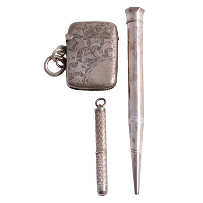 Lot 536 - A silver pencil, vesta case, and cigar piercer.