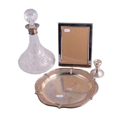 Lot 372 - SIlver-mounted ship's decanter, silver dwarf candlestick, plated salver and photograph frame