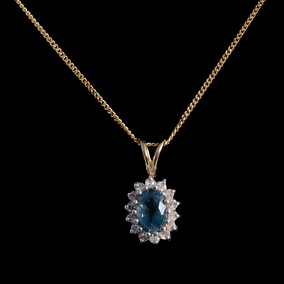 Lot 334 - Two gemset pendants on chains, diamond, and heat-treated blue topaz and diamond.