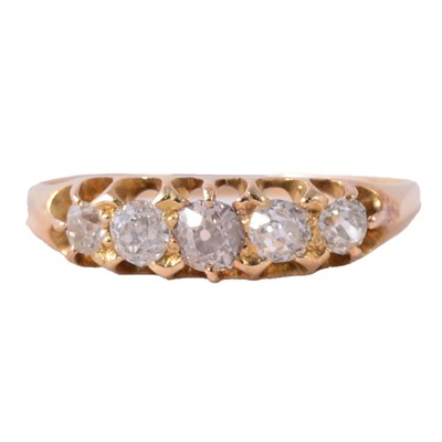 Lot 56 - A diamond five stone ring.