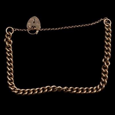 Lot 296 - A 9 carat yellow gold curb link bracelet.