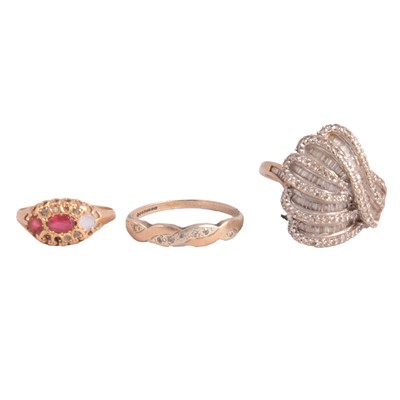 Lot 301 - 18ct gold garnet set ring, two modern 9ct gold dress rings