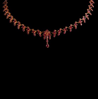Lot 360 - A ruby necklace.