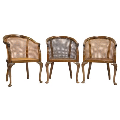 Lot 517 - Three mahogany bergere armchairs