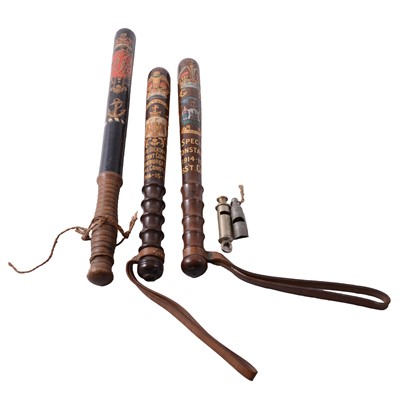Lot 172 - Three Constable's painted truncheons, and two whistles