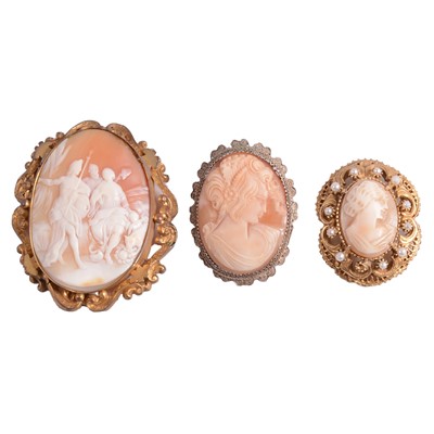 Lot 326 - A Victorian carved shell cameo brooch and two others.