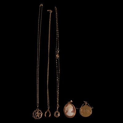 Lot 1124 - A cameo pendant and four others.