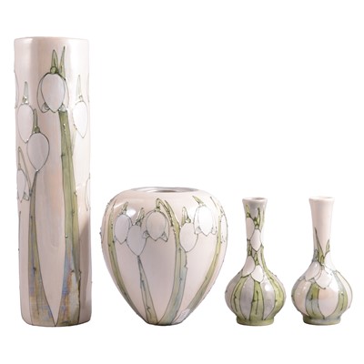 Lot 8 - Lise B Moorcroft, a collection of four 'Snowdrop' pattern vases