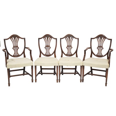 Lot 495 - Set of eight Hepplewhite pattern mahogany and stained wood dining chairs