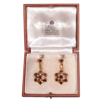 Lot 358 - A pair of vintage garnet and pearl earrings in a Garrard box.