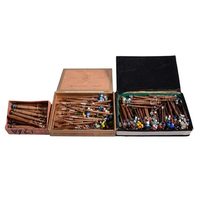 Lot 153 - A very large collection of pillowlace bobbins, handmade lace etc.