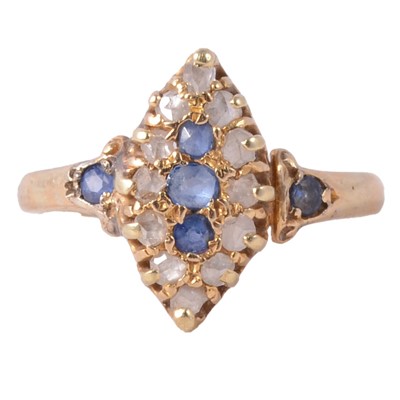 Lot 48 - A sapphire and diamond marquise ring.