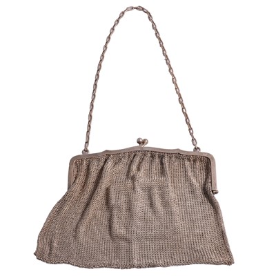 Lot 1218 - A silver chain mail evening bag and purse.