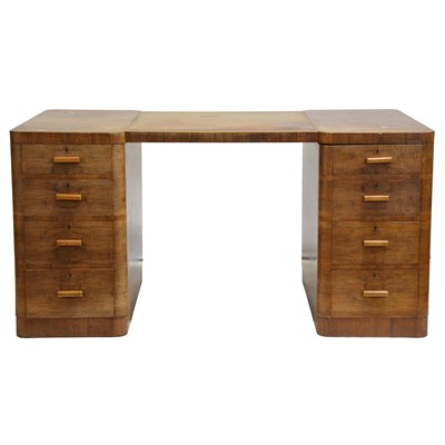 Lot 223 - An Art Deco walnut twin-pedestal desk, by Maple & Co