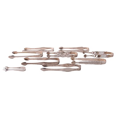 Lot 232 - Nine pairs of silver sugar tongs.