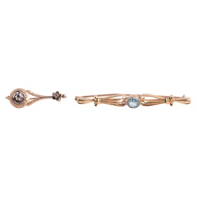 Lot 254 - Two gemset brooches, diamond, blue zircon.