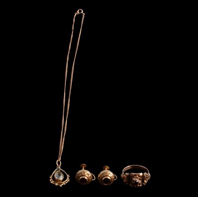 Lot 1127 - An aquamarine pendant on a chain, pair of garnet earscrews, and garnet and seed pearl ring.