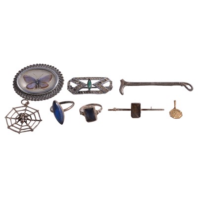 Lot 1249 - A gold charm, and white metal and costume jewellery rings, brooches, pendant.