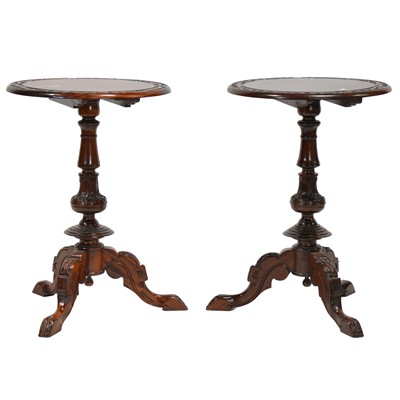 Lot 331 - Pair of Victorian style carved hardwood tripod tables