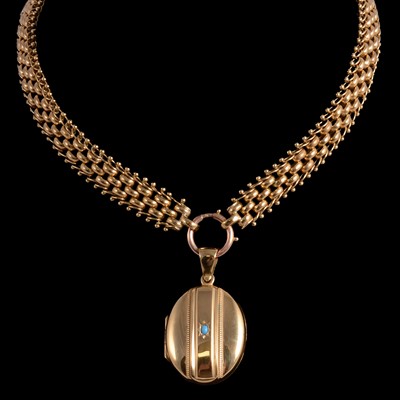 Lot 1162 - A Victorian style yellow gold-plated collar and locket.