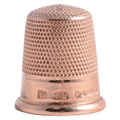 Lot 1221 - A Charles Horner 9 carat rose gold thimble.