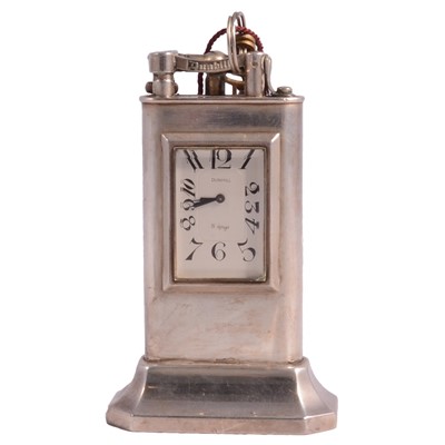 Lot 1198 - Dunhill - a silver-plated "Unique" Club model line lighter with clock.