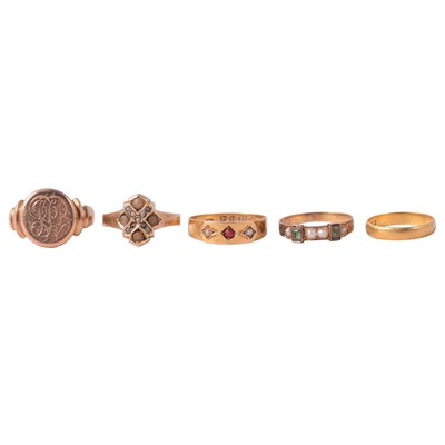 Lot 154 - A 22 carat gold wedding band, two 15 carat gold gemset rings, and two other rings.
