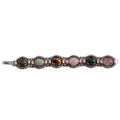 Lot 370 - A white metal bracelet set with agates.