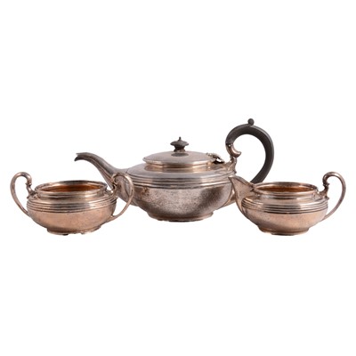 Lot 280 - A silver three piece teaset, Baker & Co, London 1922