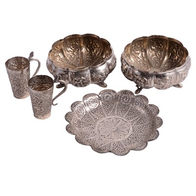 Lot 274 - A collection of Indian white metal items, to include a pair of open dishes, two spirit measures, and filigree dish.