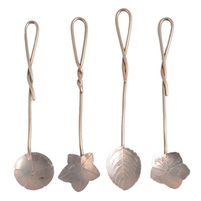 Lot 269 - A French sifting spoon and four floral and leaf spoons.