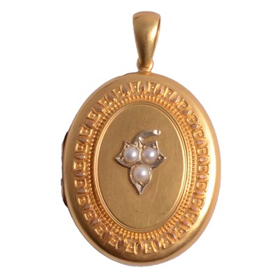 Lot 408 - A Victorian yellow metal locket in original fitted case.