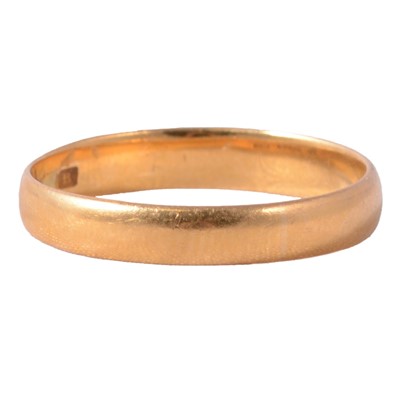 Lot 167 - A 22 carat gold wedding band.