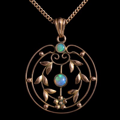 Lot 383 - An Edwardian opal pendant on a chain.383