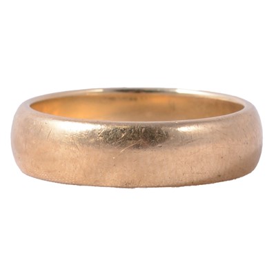 Lot 184 - A 9 carat yellow gold wedding band.