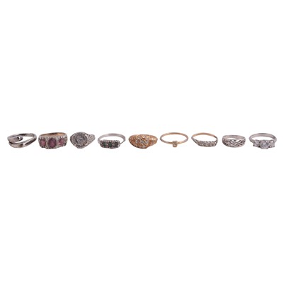 Lot 1247 - Seven white metal rings, some gemset, and two costume jewellery rings.