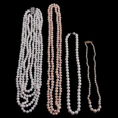 Lot 577 - A collection of freshwater pearl necklaces, and gold-plated jewellery.