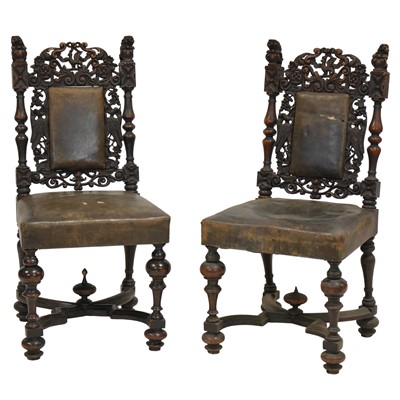 Lot 354 - Pair of continental carved walnut side chairs