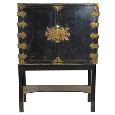 Lot 369 - Black lacquered and chinoserie decorated cabinet on stand