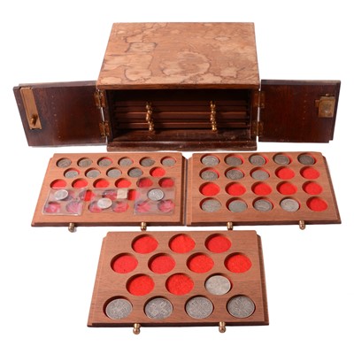 Lot 212 - Collection of mostly British silver content coins, in a wooden coin cabinet.
