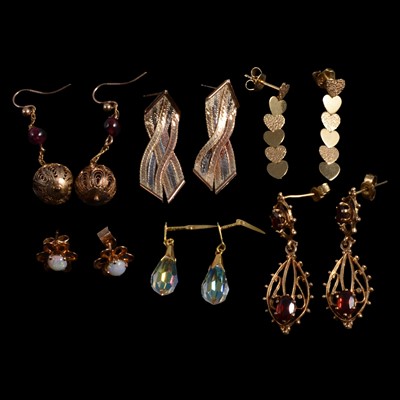 Lot 459 - Nine pairs of 9 carat yellow gold earrings, some gemset, and costume jewellery earrings.