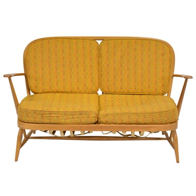 Lot 415 - Ercol beech two seat settee
