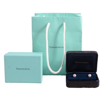 Lot 1187 - Tiffany & Co - a pair of cultured pearl earstuds.