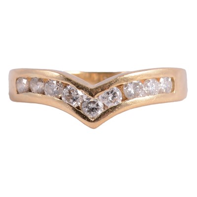 Lot 109 - A diamond set wishbone ring.