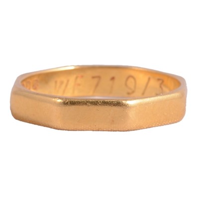 Lot 169 - A 22 carat gold wedding band.