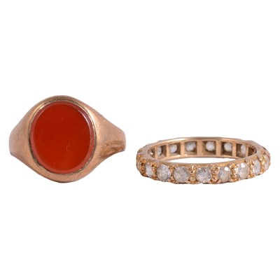 Lot 139 - A cornelion signet ring, and a synthetic white stone (not diamond) full eternity ring.