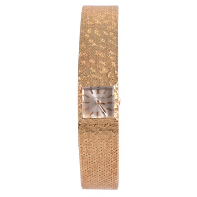 Lot 1087 - Jaeger-leCoultre – a lady’s 18 carat yellow gold manual wind bracelet wristwatch