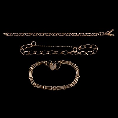 Lot 300 - Three 9 carat yellow gold bracelets.