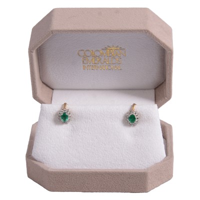 Lot 436 - A pair of emerald and diamond cluster earclips.